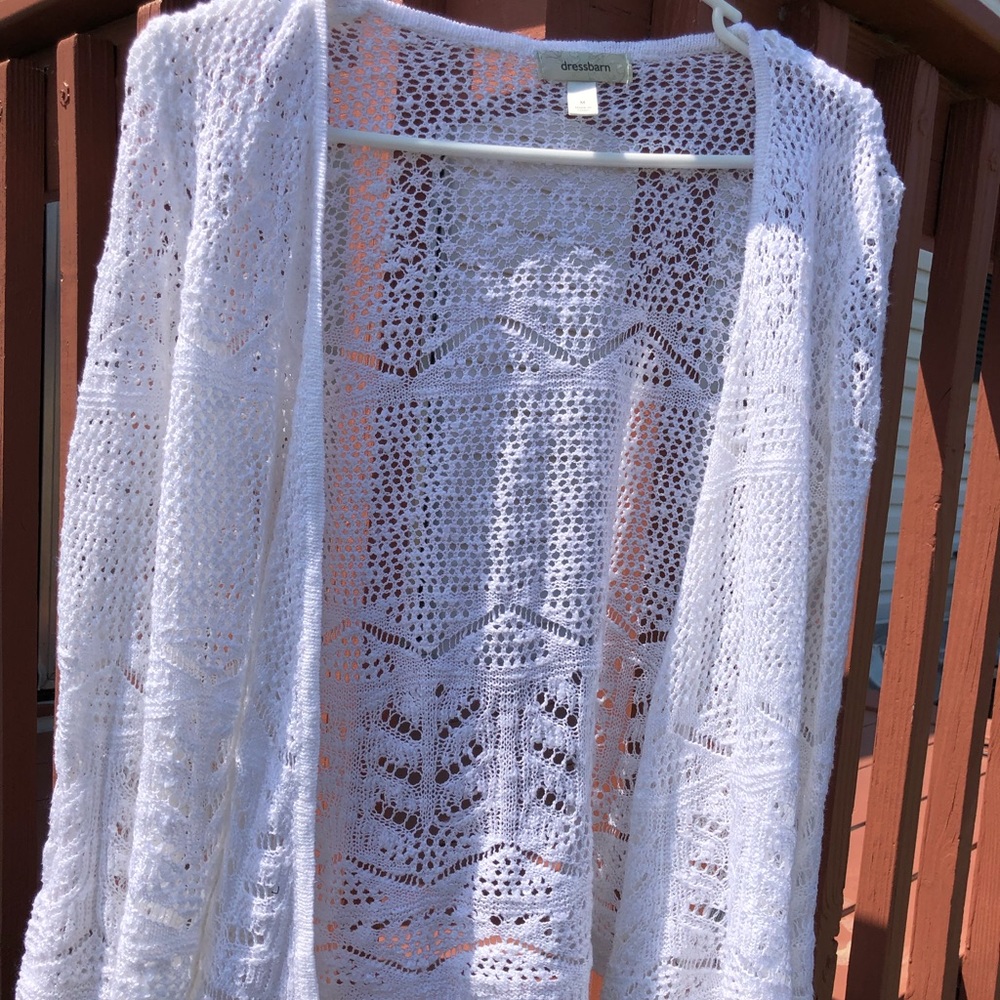 white jacket with holes . size M